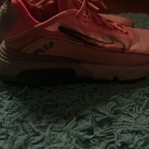 I’m selling pink Nike shoes and they’re a size 7.5 in women.